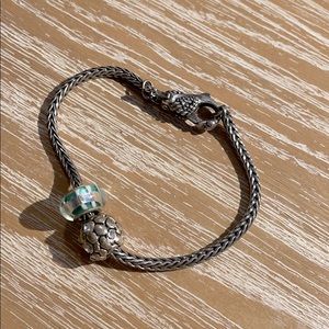 Trollbeads charm bracelet, swan lock, two charms